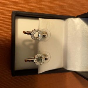 Original Swarovski hoop earrings.  Silver color with crystals.